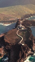 Wall Mural - Aerial view of Punta de Teno lighthouse on Tenerife island at sunrise, Spain. Beautiful landscape of rocky Tenerife coast with historic lighthouse, Canary Islands, Spain