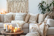© osagvsa - 'Cozy Bohemian Living Room: A Warm and Inviting Space Featuring a Plush Sofa with Textured Pillows, a Wooden Coffee Table Adorned with Candles, and Macrame Wall Art, Creating a Relaxed and Comfortable