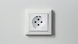 © Jafree - European-style electrical socket on a white wall. Concept of electricity, power outlet, home interior, minimalistic design