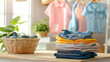 © Roxy jr. - A close-up of a stack of freshly washed and ironed laundry. In the background, a light home interior. The concept of order, cleanliness, and tidiness.