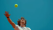 © MikeLegend - Man reaching to hit tennis ball
