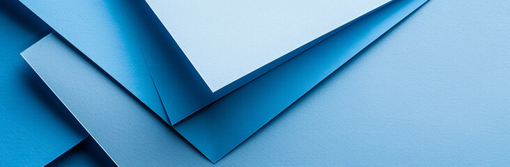 Poster - a blue background with an empty paper for copy space. 