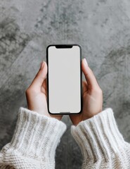 Poster - Close-up of hands holding an iPhone with a blank screen for app presentation or mockup