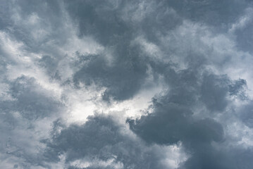 Wall Mural - Contrast dramatic cloudy sky. The sky with thunder clouds.
