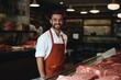 © Yuliia - Young smiling butcher slicing expensive organic meat shop grocery store vendor satisfied customer beef pork chicken fresh food raw uncooked food supply protein product butchery barbecue store
