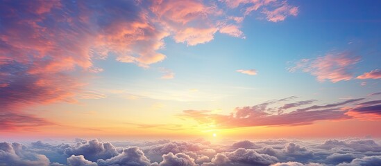 Wall Mural - Beautiful sunrise with picturesque clouds, perfect for a copy space image.
