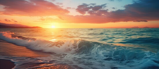 Aufkleber - Sunset over the sea with a tranquil tide and a beautiful view in the background with copy space image.