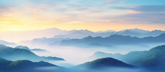 Poster - Scenic misty sunrise over mountains with clouds, perfect for a copy space image.