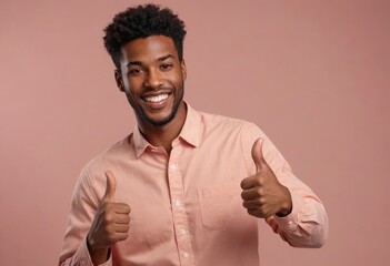 Wall Mural - A man with a bright smile wearing a peach shirt, giving a thumbs up. His confident demeanor and casual outfit express a friendly and upbeat character.