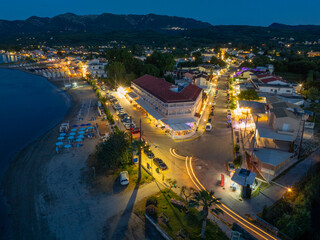 Wall Mural - Beautiful drone view of roda beach village in north corfu, Greece , Night view in summer