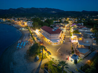 Wall Mural - Beautiful drone view of roda beach village in north corfu, Greece , Night view in summer