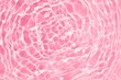 © Amona HD - Abstract pink water surface. Closeup of clear calm water surface texture with ripples, splashes. Transparent shiny water waves with sunlight. Natural summer banner background with Copy space, top view