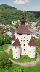 Sticker - Aerial view of the New Castle in Banska Stiavnica, Slovakia. Banska Stiavnica mining town cityscape in summer. Popular tourist destination in Slovakia. Drone orbit shot