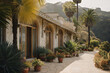 © ADDICTIVE STOCK - Tranquil villa path with lush plant decoration. Generative AI image