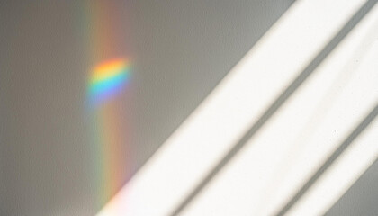 Overlay effect for photo and mockups. Organic drop diagonal shadow and ray of light with rainbow from window on a white wall.