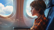 © wiparat - A boy sitting seat in airplane