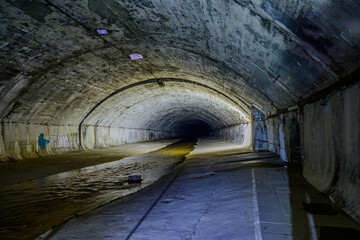 Wall Mural - underground riverbed of the river wienfluss near karlsplatz, vienna, austria