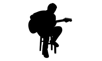 silhouette of man playing guitar