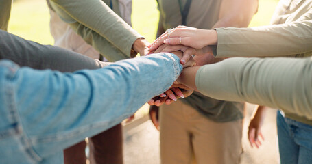 Wall Mural - Hands, people and volunteer for climate change, stack and support for motivation, teamwork and eco friendly. Closeup, group or friends in park, gesture and circle for cooperation, nature or earth day