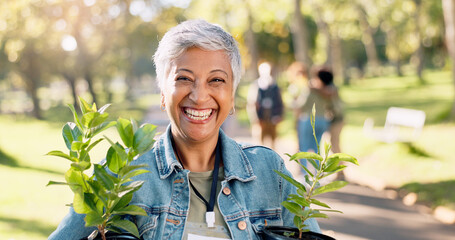 Volunteer, portrait or happy woman with plants at park for gardening, earth day or sustainability in nature. Ecology, face or mature person with tree for environment conservation or community service