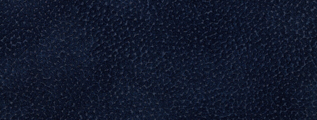 Wall Mural - Navy blue matte background of suede fabric, closeup. Velvet texture of seamless ultramarine textile, macro.