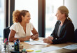 © ArcursPI/peopleimages.com - Teamwork, meeting and business women in office for discussion, legal consulting and agreement. Corporate lawyer, law agency and woman with client and paperwork for contract, collaboration and report