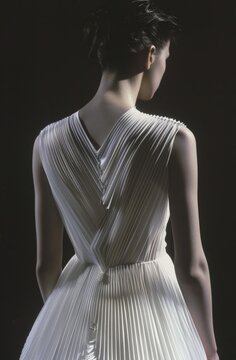 Dramatic pleated white dress