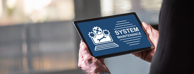 Canvas Print - System maintenance concept on a tablet