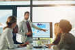 © Nikish Hiraman/peopleimages.com - Presentation, chart and stock market for man, explaining and pointing of stats for growth and sales. Boardroom, employee and people in meeting for finance, increase and investment in car insurance