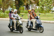 © DragonImages - Friends riding motorbikes together on a sunny day, showcasing adventure and camaraderie