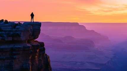 Wall Mural - A hiker hiking in rugged land with majestic view.