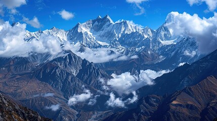 Wall Mural - Majestic Snow-Capped Mountain Range Against Blue Sky and White Clouds: A Breathtaking 8K Landscape