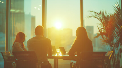 Poster - Silhouetted people in a meeting at sunset in an office, against an urban skyline background, concept of business teamwork. Generative AI