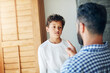 © peopleimages.com - Sorry, dad and discipline child in home with learning a lesson from mistake with psychology. Kid, fail and father teaching son to behavior or frustrated with problem or communication of conflict