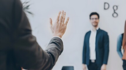 A business professional waves goodbye to colleagues in a modern office environment, symbolizing farewell or a new opportunity.