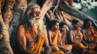 © Adrian Grosu - An Indian old sadhu sitting under a tree with a group of disciples