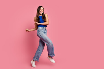 Sticker - Full length photo of adorable lovely girl wear tank top dancing walking empty space isolated pink color background