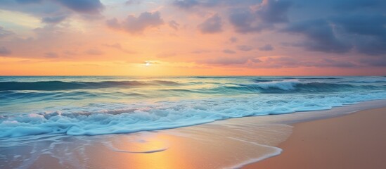 Poster - A breathtaking image of a serene beach at sunset with ocean waves, offering a peaceful paradise vibe and plenty of copy space image.