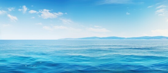 Aufkleber - Tranquil blue sea surface banner with copy space image.