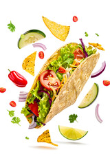 Wall Mural - Taco, corn tortilla wrap with falling vegetables isolated on white background