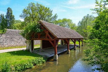 Wall Mural - Wash-house along the Fusain river in the Parc de la Tabarderie in Château-Landon, a rural village of the Gâtinais in the French department of Seine-et-Marne, Paris Region, France