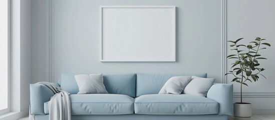 Wall Mural - A minimalist living room with a baby blue sofa and a blank white frame on the wall, presenting a serene ambiance.