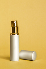 Poster - Atomizer on yellow background