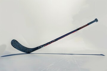 Wall Mural - A lone hockey stick lying flat on a clean white background