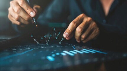 A businessman sketches a growth graph, symbolizing financial analysis and strategic planning against a blue backdrop.