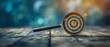 © Naret - Minimalist scene of a magnifying glass highlighting a target with financial growth symbols