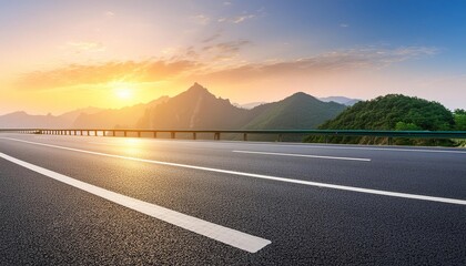 Asphalt road and beautiful mountain with lake at sunset