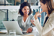 © peopleimages.com - Laptop, meeting and happy business women in office for discussion, talking and consulting for online proposal. Corporate, financial advisor and people on computer for planning, website and report
