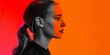© mashimara - Profile of a young woman with a ponytail, split by contrasting red and orange lighting. The image creates a dramatic and artistic composition, exploring themes of duality in portrait photography.