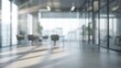 © Adi - blurred background of a modern office interior in gray tones with panoramic windows
